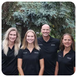 Chiropractor Holmen WI Mike Berkley With Team